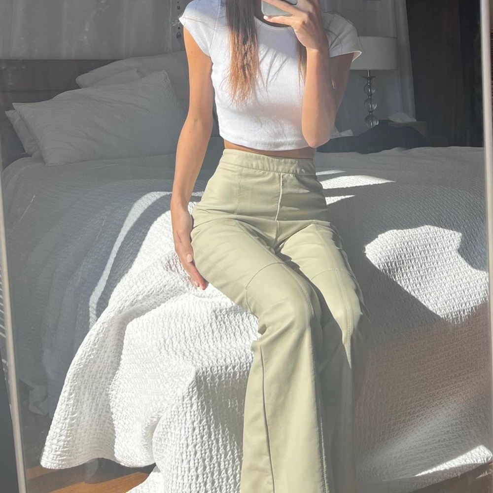 Glassons high waisted faux leather flared pants in nude.